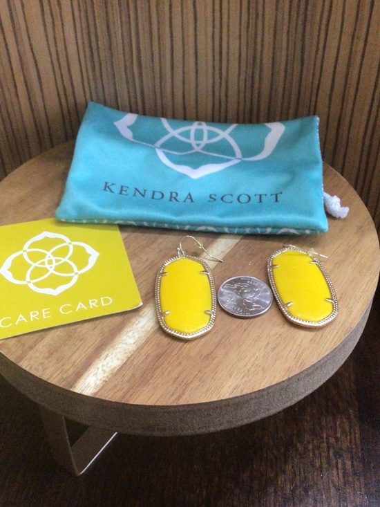 Kendra Scott Jewelry - Kendra Scott, gold/yellow earrings. In new condition with care card and bag.